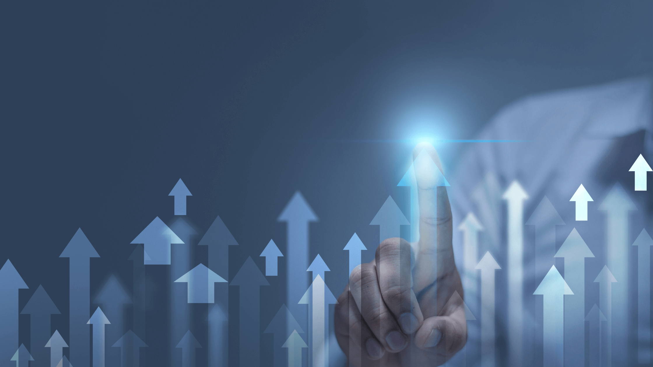 A person's finger is pointing to a glowing blue upward arrow among many other arrows on a dark background, symbolizing strategic planning for business growth and maximizing the QBI deduction.