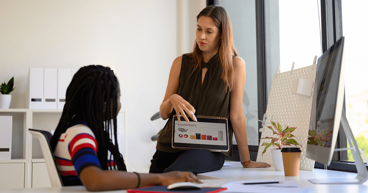 Business team reviewing January financial strategy and profit planning